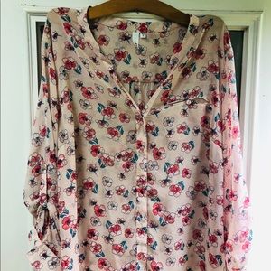 Sheer floral long sleeve blouse.